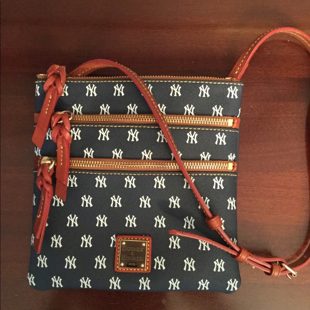 Navy Yankees cross body Dooney and Bourke bag